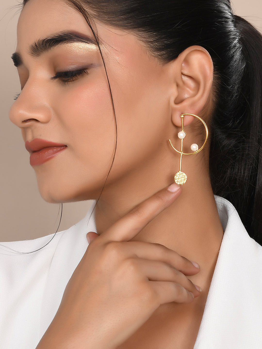 Gold plated pearl half hoop earring