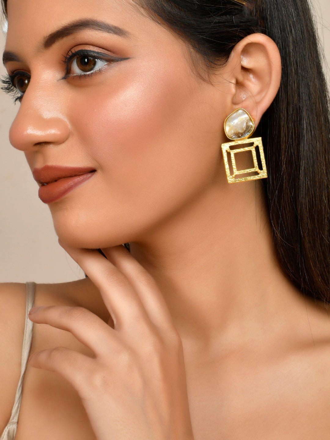 Gold plated mother of pearl drop earring