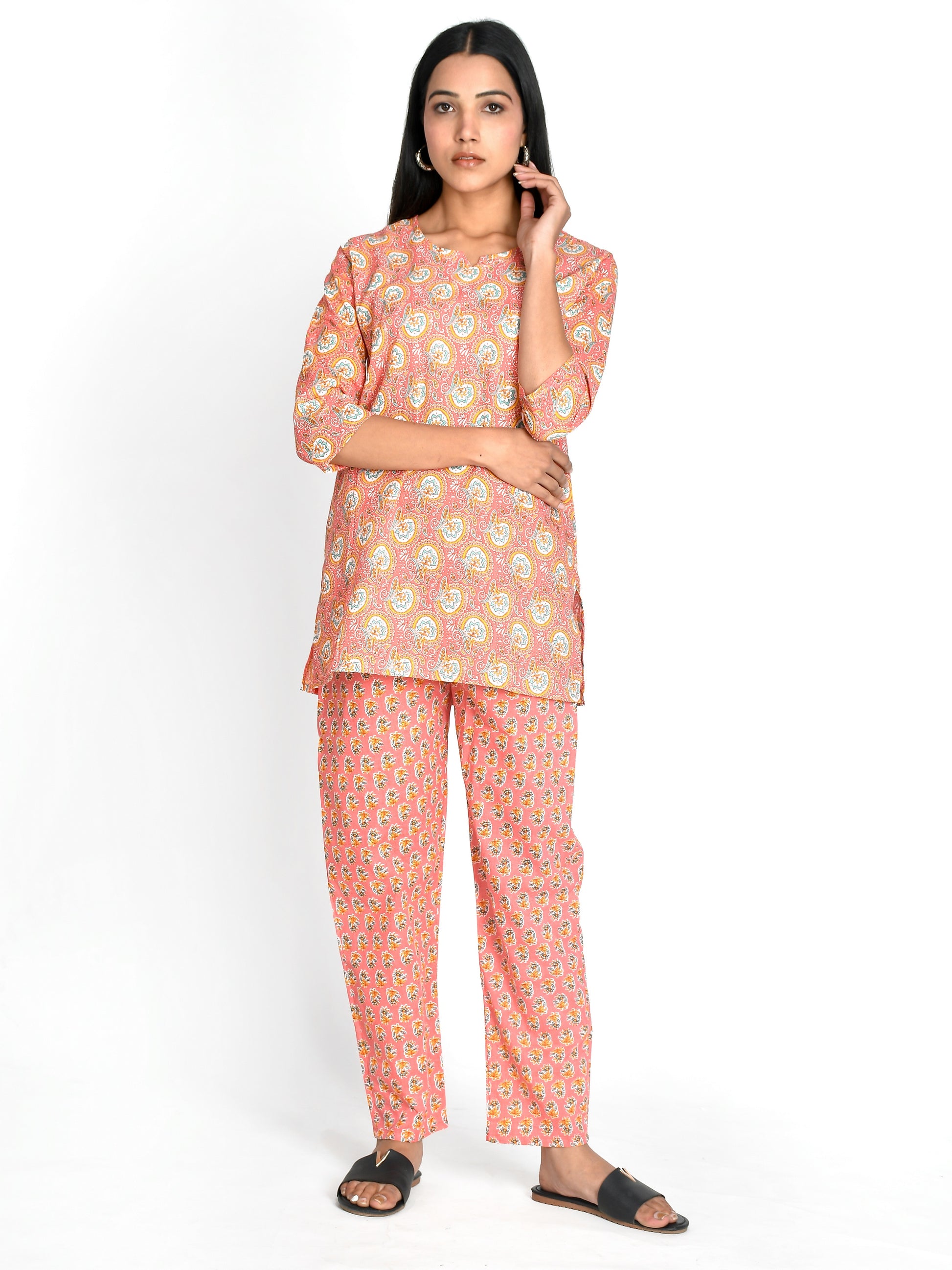 Stay comfortable and stylish with our Women Peach Colored Night Suit. Made for girls and women, this night suit is perfect for a good night's sleep or lounging at home. Made from high-quality materials, it offers a perfect balance of comfort and fashion. Elevate your sleepwear game with this must-have set.