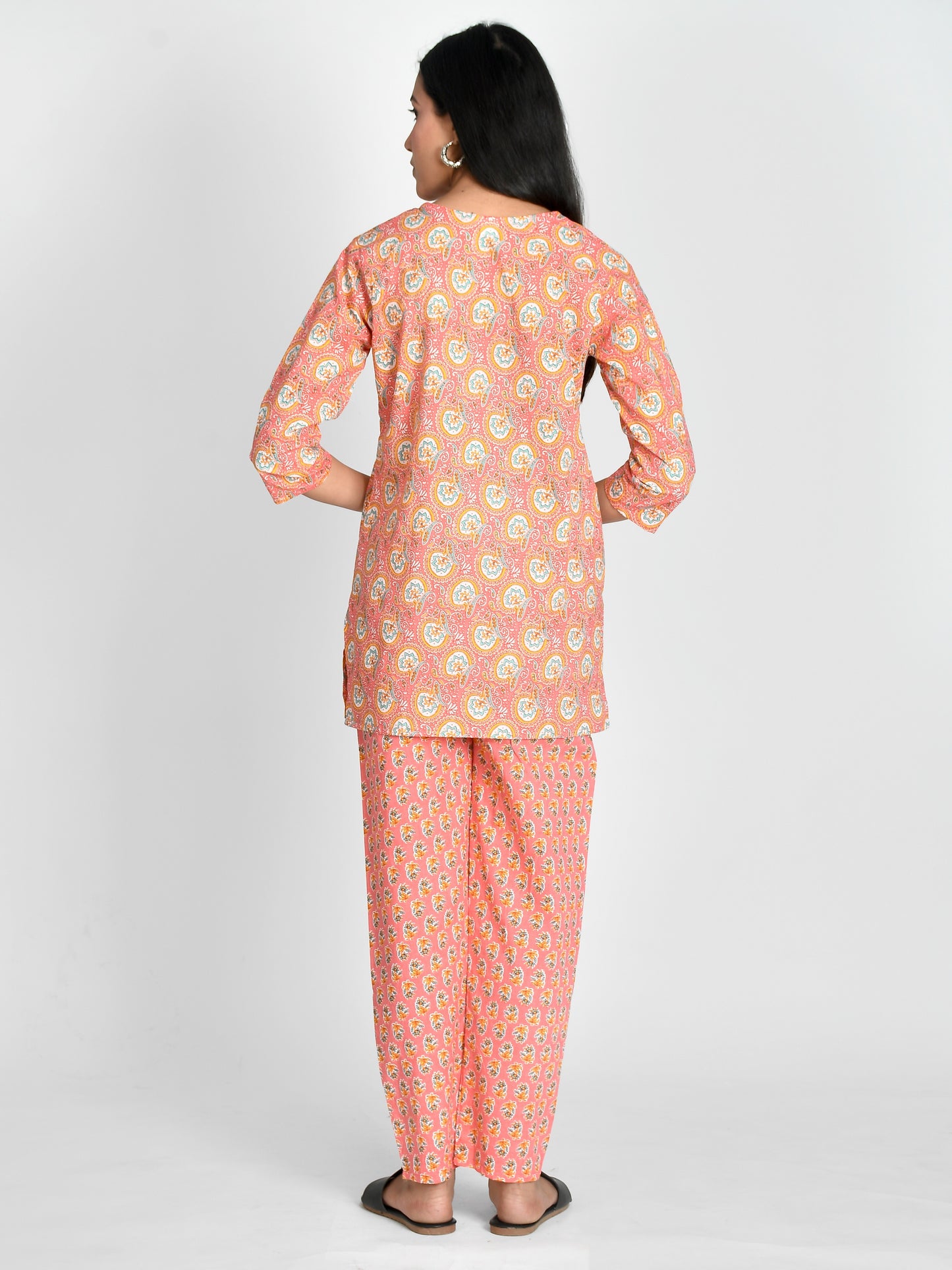 Stay comfortable and stylish with our Women Peach Colored Night Suit. Made for girls and women, this night suit is perfect for a good night's sleep or lounging at home. Made from high-quality materials, it offers a perfect balance of comfort and fashion. Elevate your sleepwear game with this must-have set.