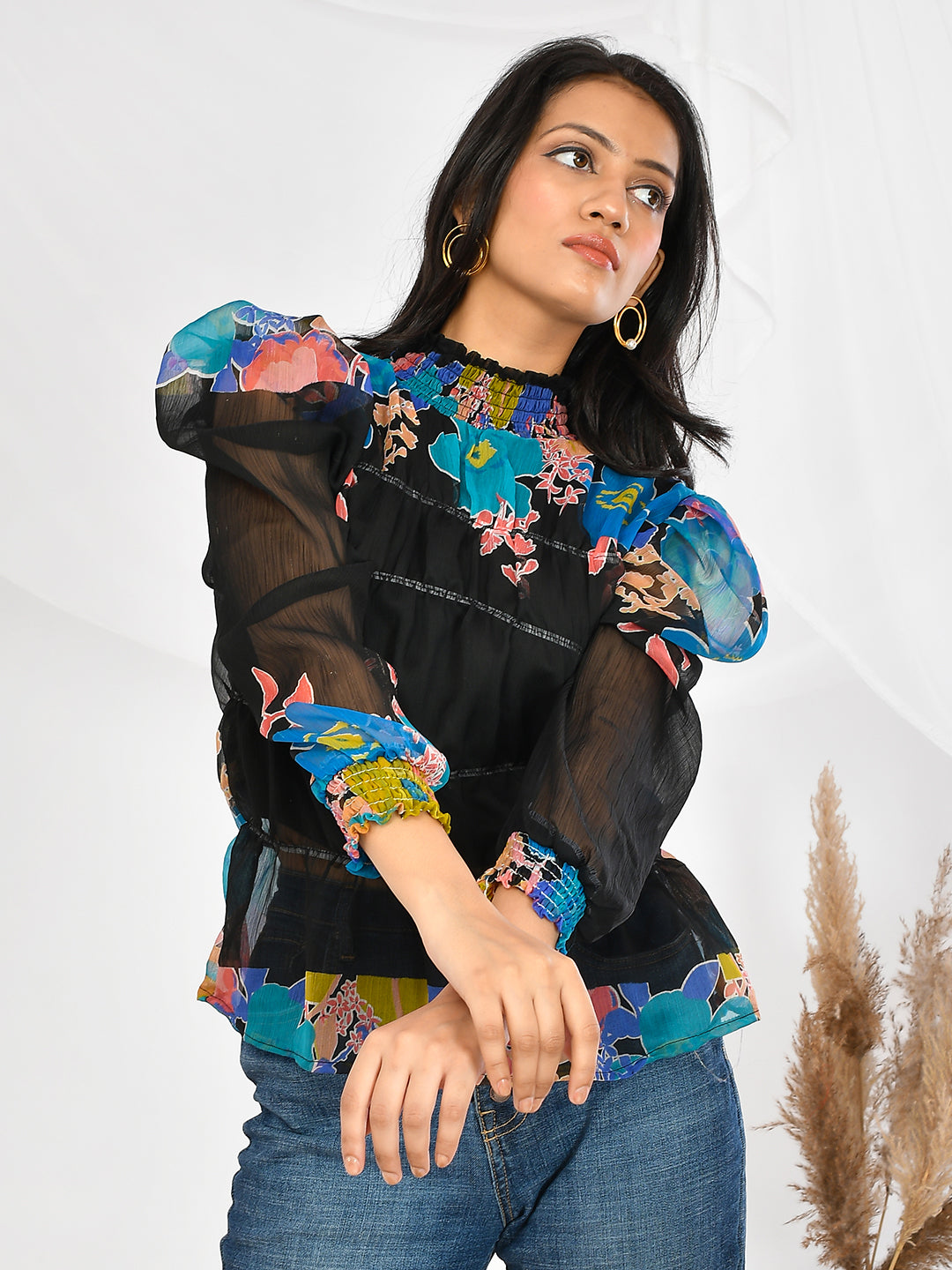 This Floral Printed Chiffon High Neck Top is the perfect addition to any wardrobe. Made from high quality chiffon fabric, it is lightweight and comfortable to wear. The floral print adds a touch of femininity, while the high neck design adds a touch of elegance. Perfect for girls and women of all ages, this top is versatile and stylish for any occasion.