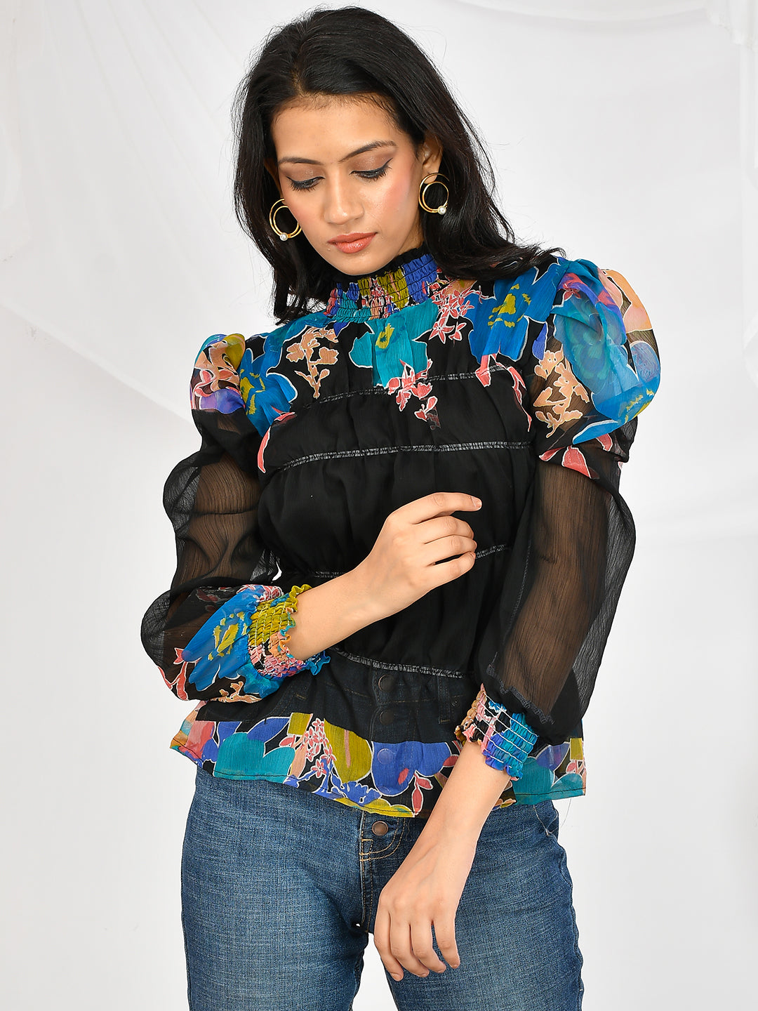 This Floral Printed Chiffon High Neck Top is the perfect addition to any wardrobe. Made from high quality chiffon fabric, it is lightweight and comfortable to wear. The floral print adds a touch of femininity, while the high neck design adds a touch of elegance. Perfect for girls and women of all ages, this top is versatile and stylish for any occasion.