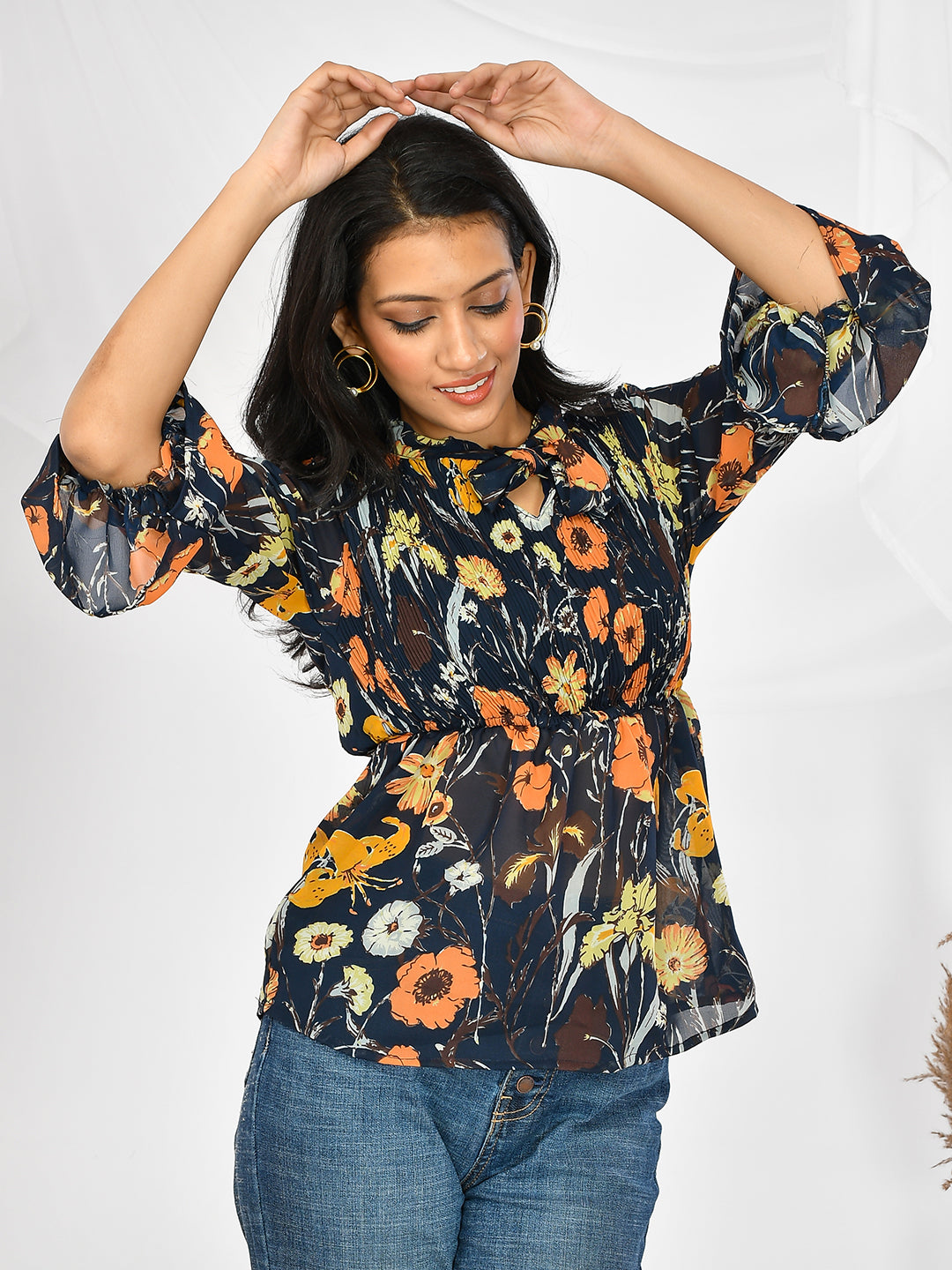 Expertly crafted with a delicate chiffon fabric, these high neck tops are adorned with a beautiful floral print. Perfect for girls and women, they offer a sophisticated and fashion-forward look. Elevate your wardrobe with airy and feminine tops that exude elegance and style.