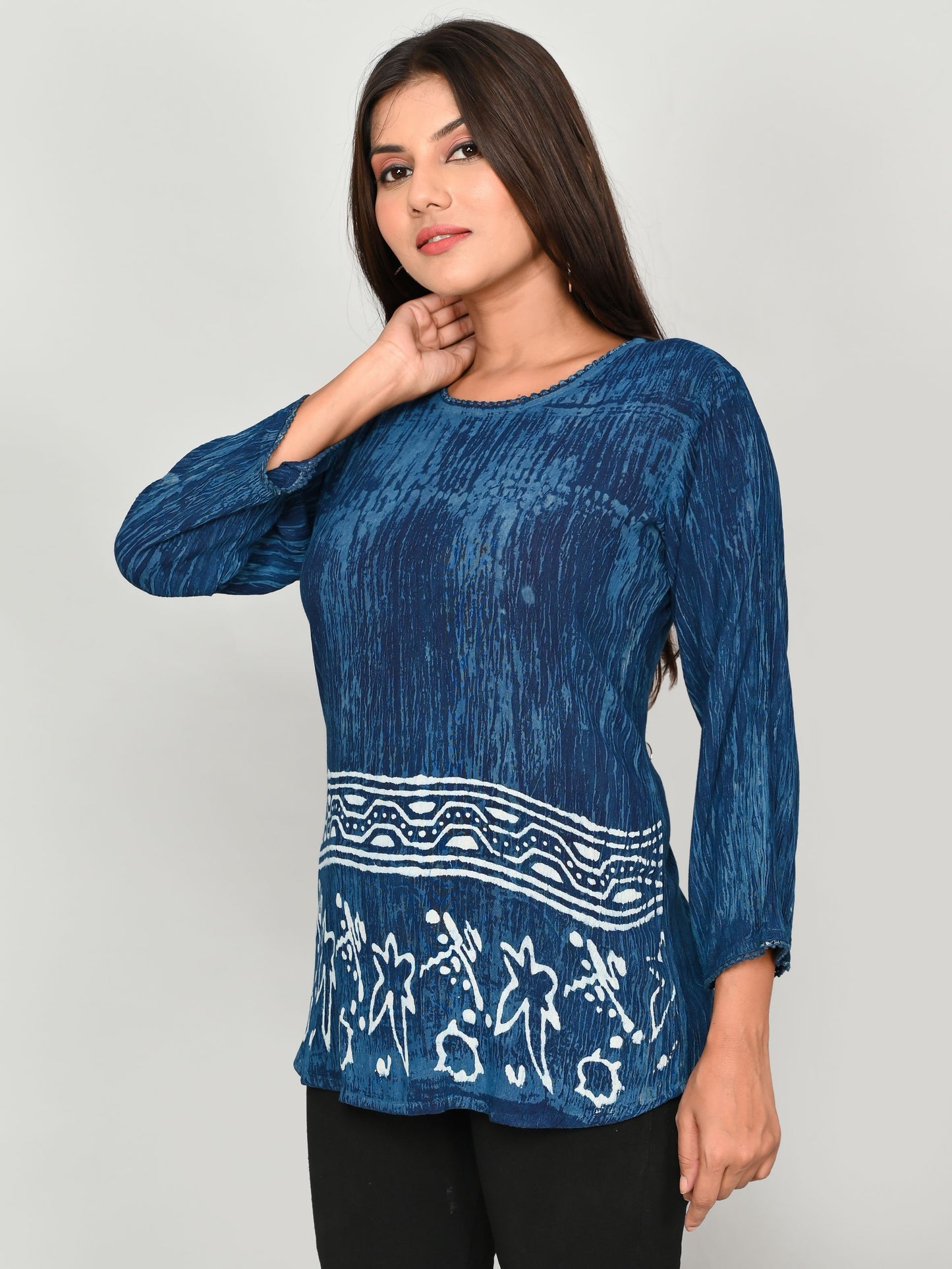 Elevate your casual style with our Navy Blue Silk Crepe Printed Casual Top for women/girls. Made with premium quality silk crepe, this top features a stylish print that adds a touch of elegance to any outfit. Soft and comfortable, it's perfect for everyday wear.