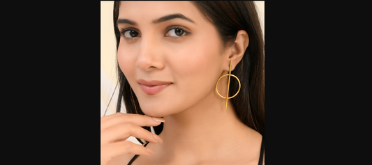 A women wearing Gold Plated Earrings