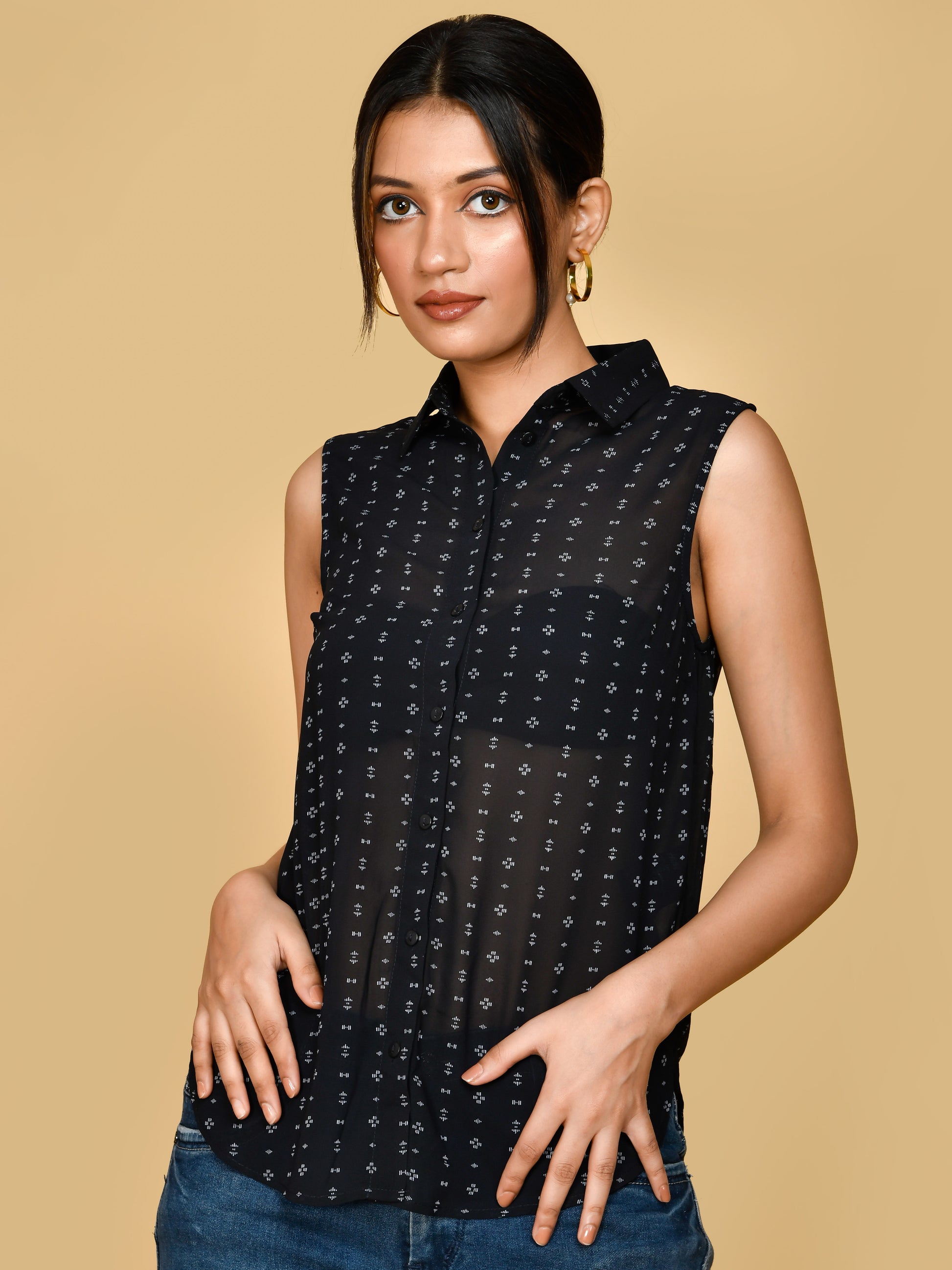 Shop This black collar neck sleeveless top for women/girls features a stylish ruffled neckline, adding a touch of elegance to any outfit. Made from high-quality material, it is comfortable to wear and perfect for any occasion. Elevate your wardrobe with this versatile and chic top.