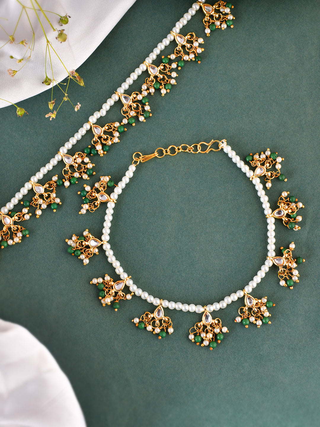 Gold tone kundan-studded pearl anklets