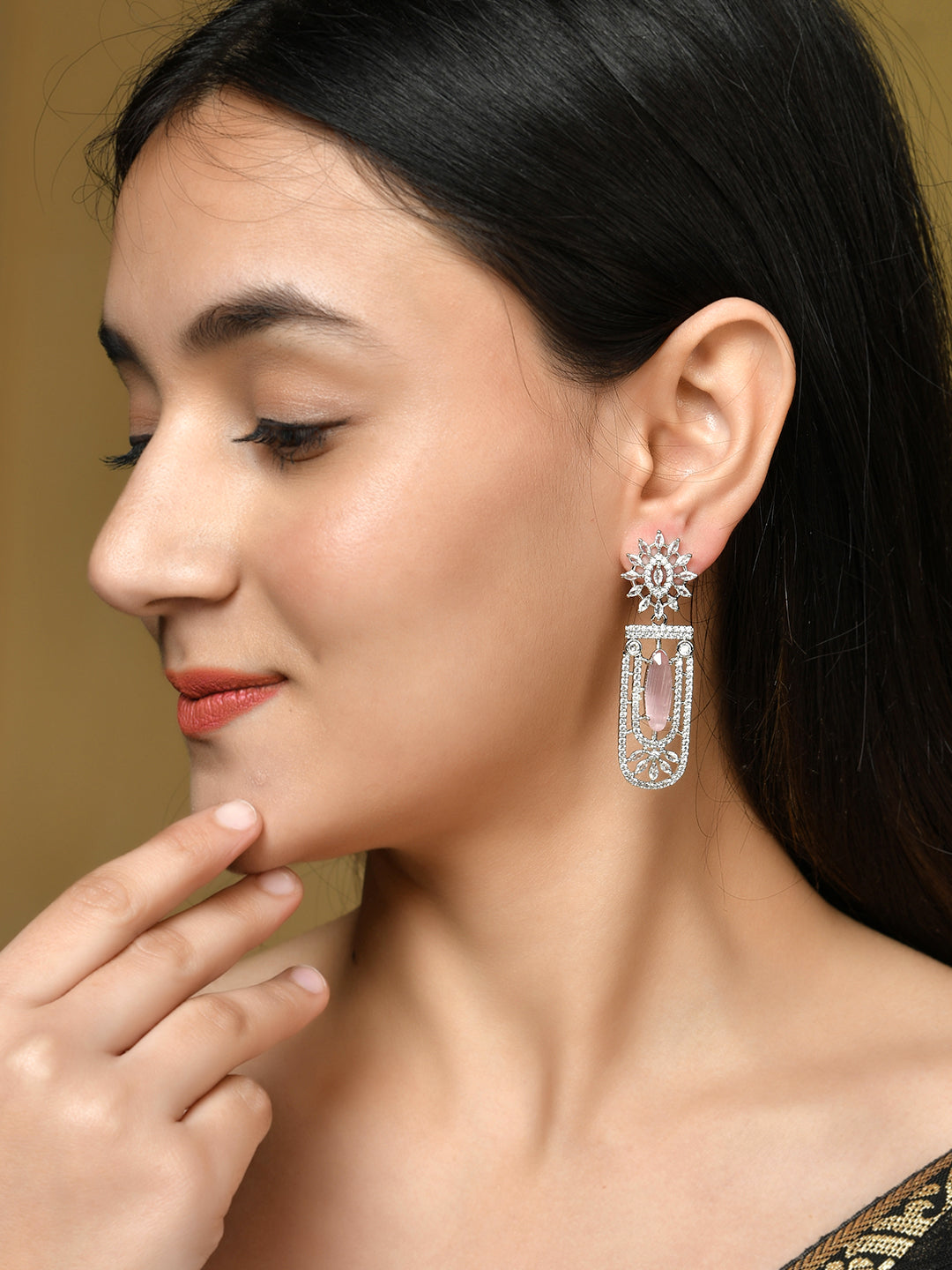 touch of elegance to your western outfits with our American Diamond Silver Plated Drop earrings for women. Crafted with precision and featuring sparkling American diamonds, these earrings are the perfect accessory for any occasion. Elevate your style and make a statement with these stunning earrings.