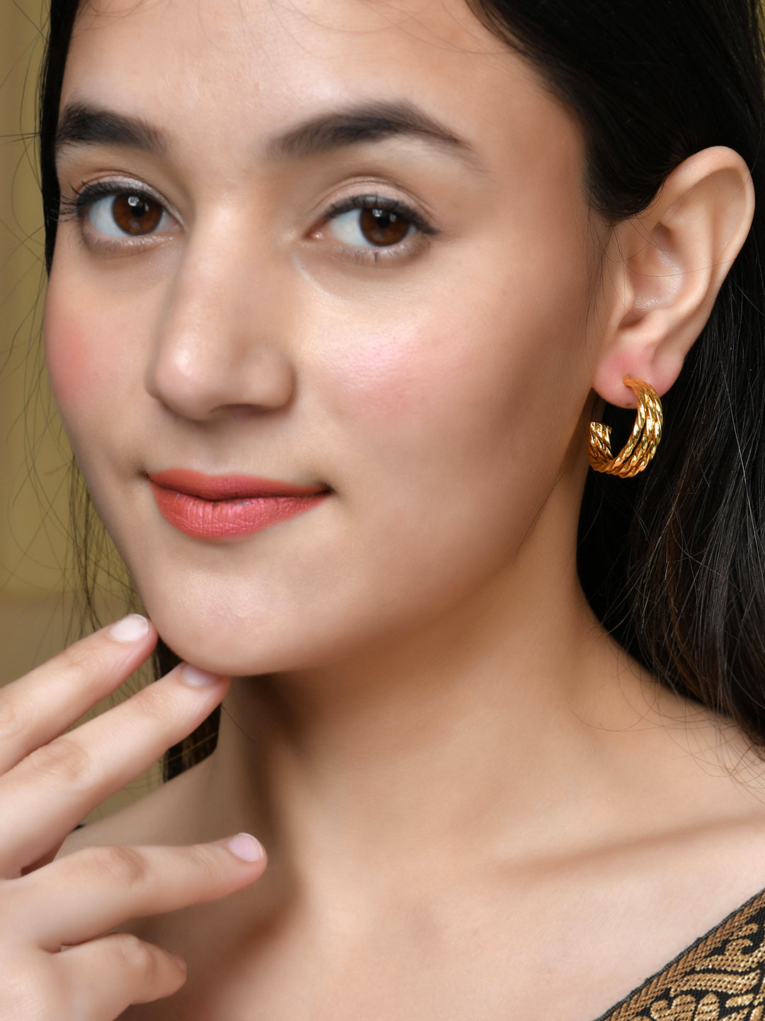 style with these stunning Gold Plated Women's Hoop Earrings. Made with expert craftsmanship and high-quality materials, these earrings will complement any outfit.