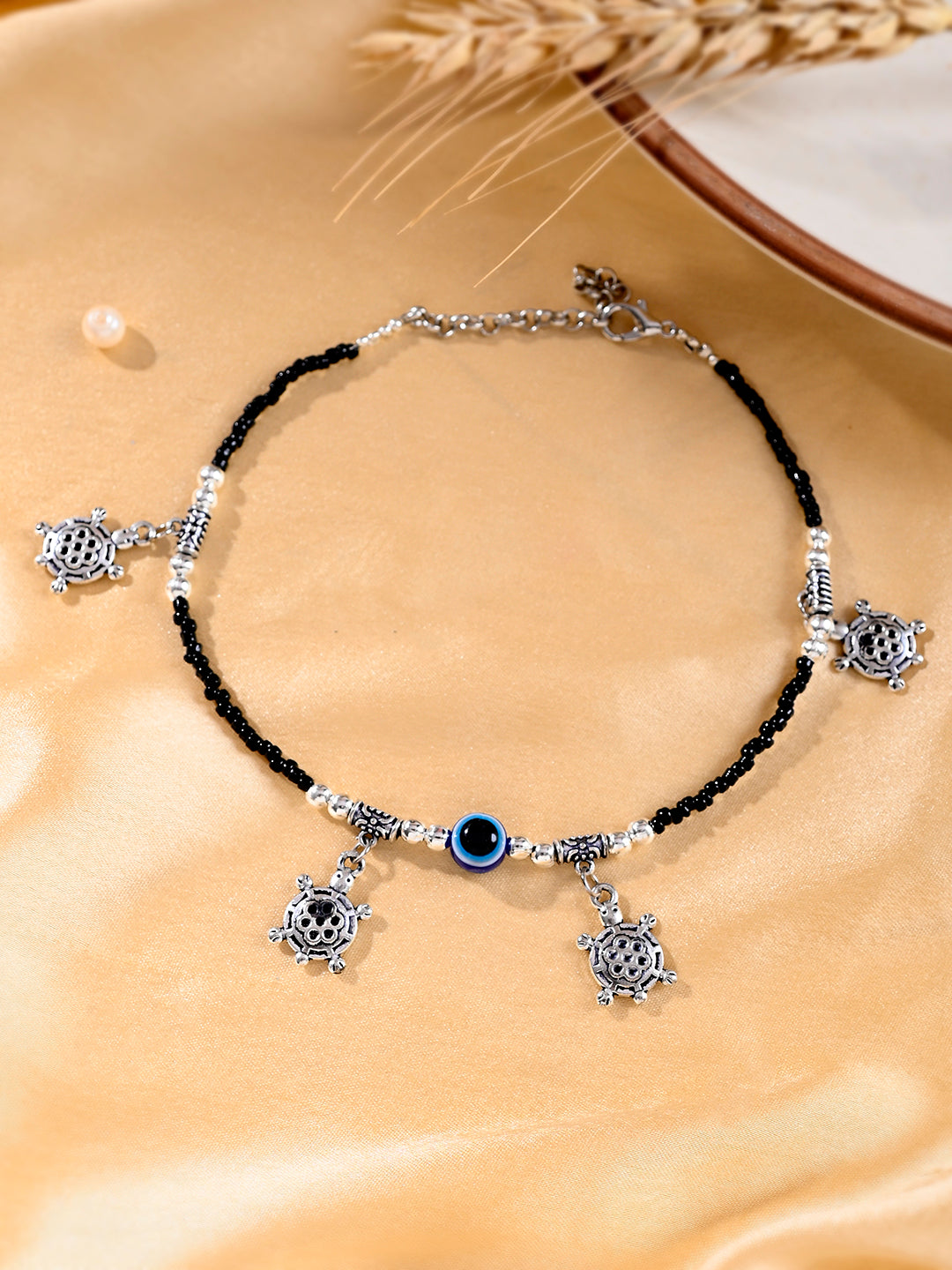 Black beads evil eye anklet