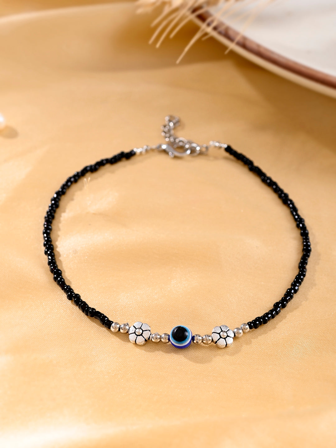 Black beads evil eye anklet