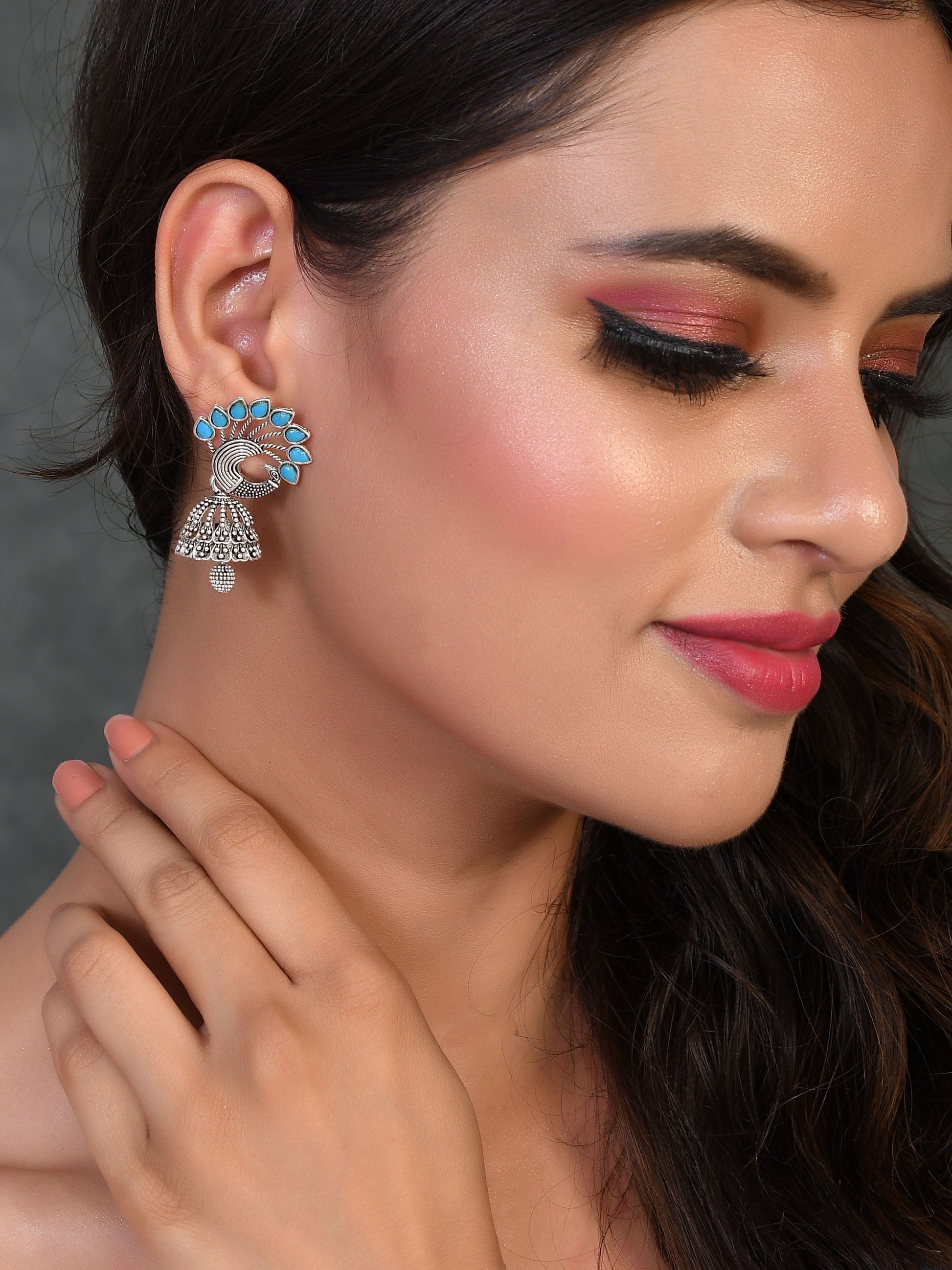 Silver Toned Oxidised peacock Jhumka earrings