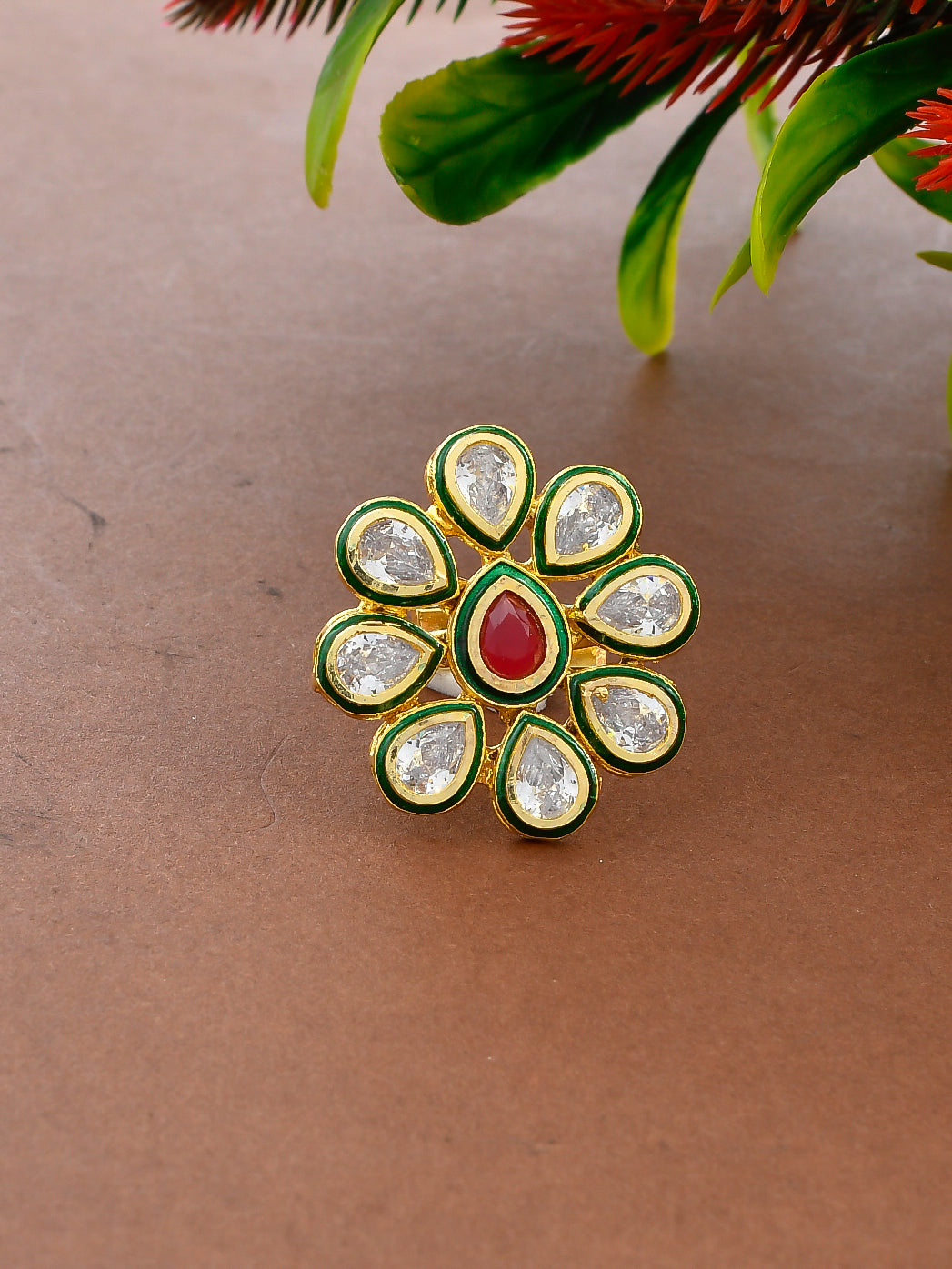 Gold Floral Ring with Red Gemstone Centerpiece