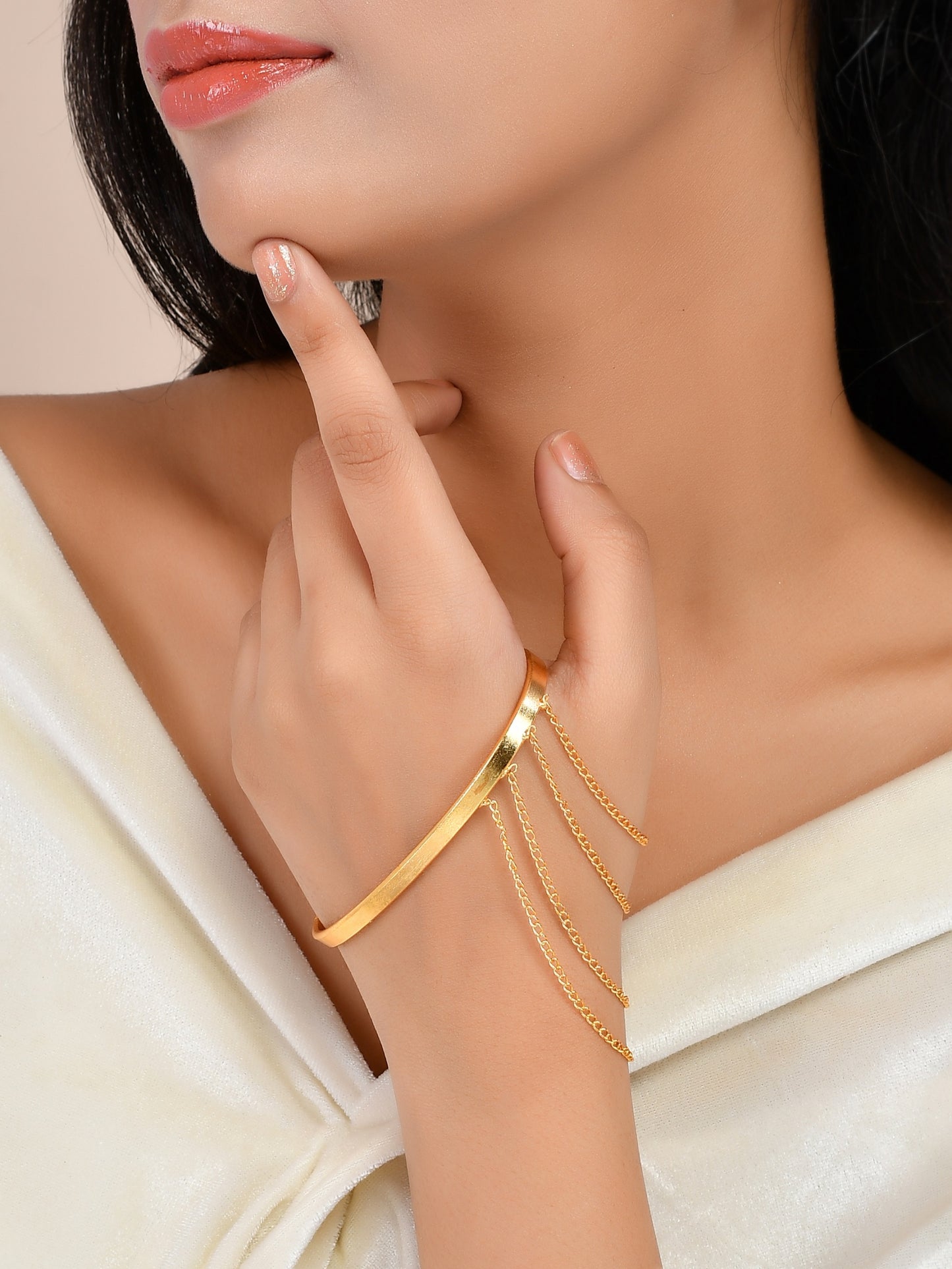 Designer gold plated palm band with thumb chain