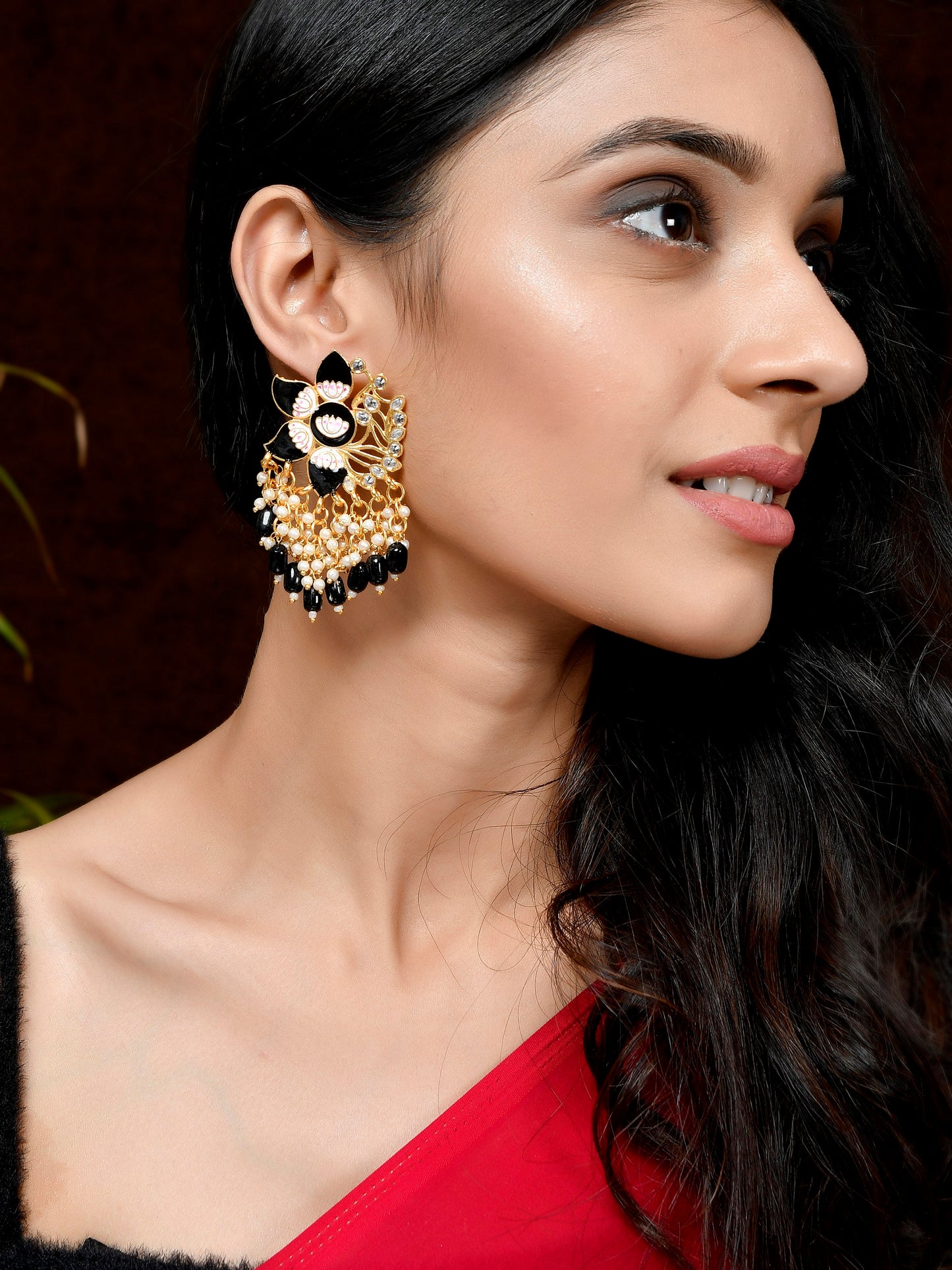 Gold Plated Black Toned Handcrafted Kundan Studded Floral Drop Earrings