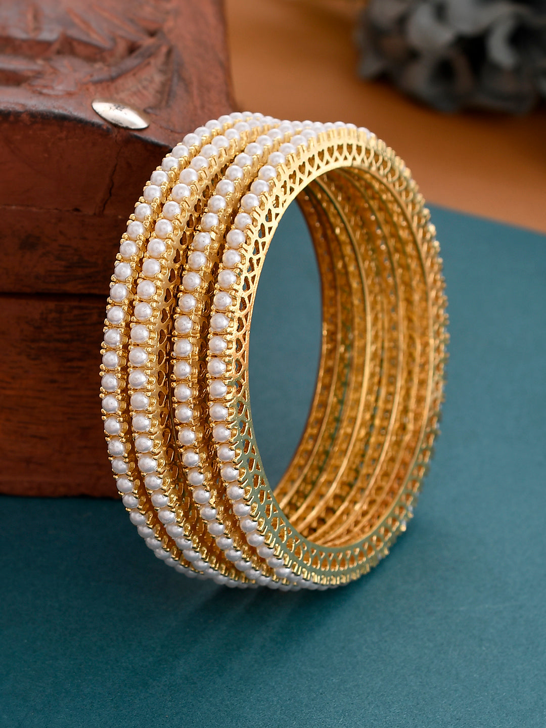Buy Set of 4 Gold Plated Pearl Handcrafted Bangles for Women Online at ...